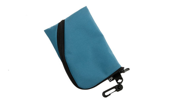 A Mini Ghost Whale Pouch in Logic Blue (light blue).